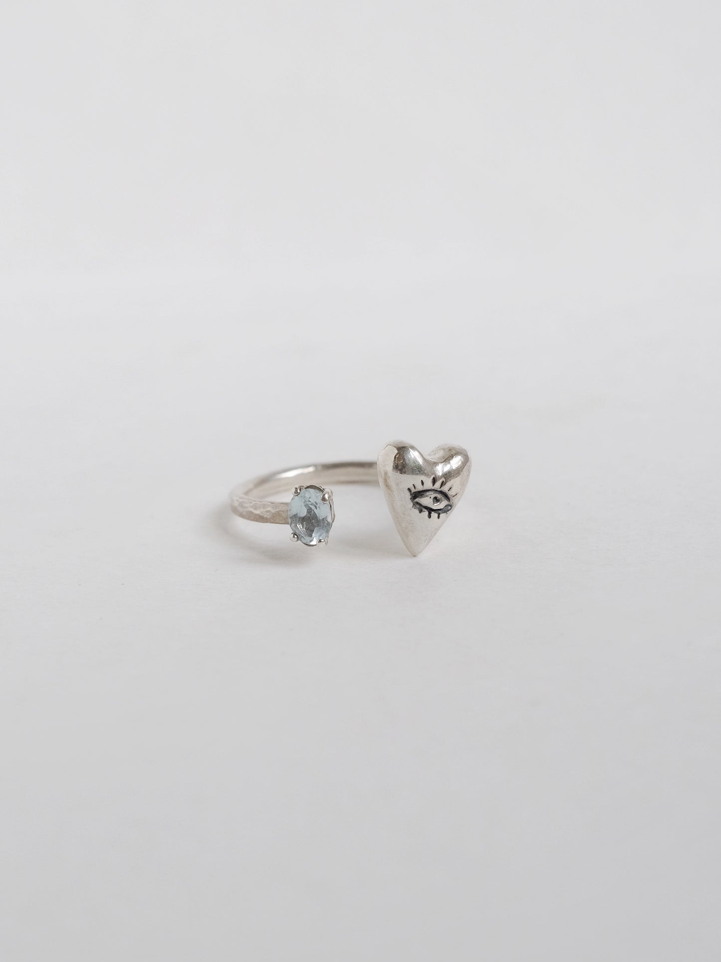 Ring Looking Heart with "Topaz"