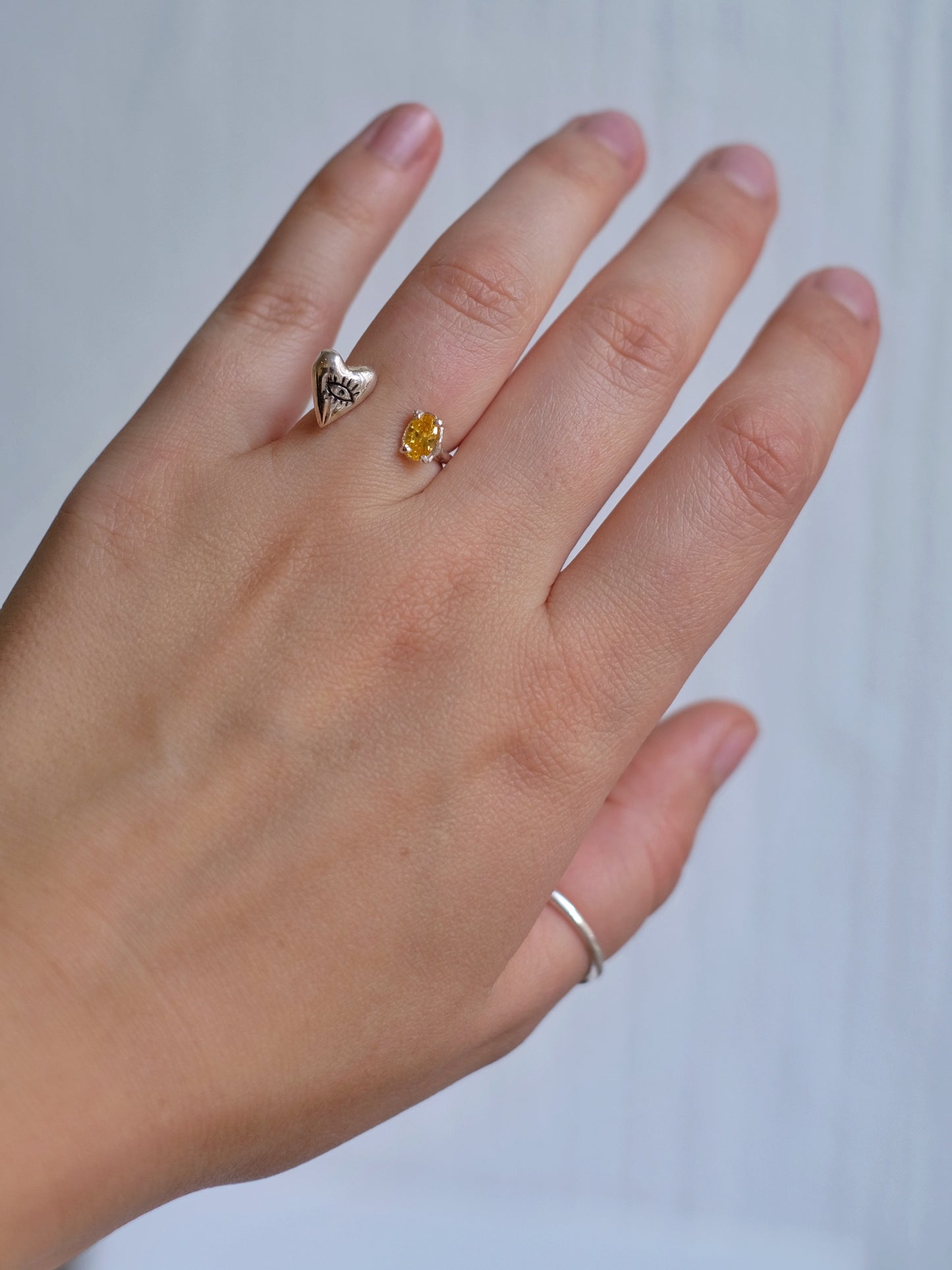 Ring Looking Heart with "Cubic zirconia orange"