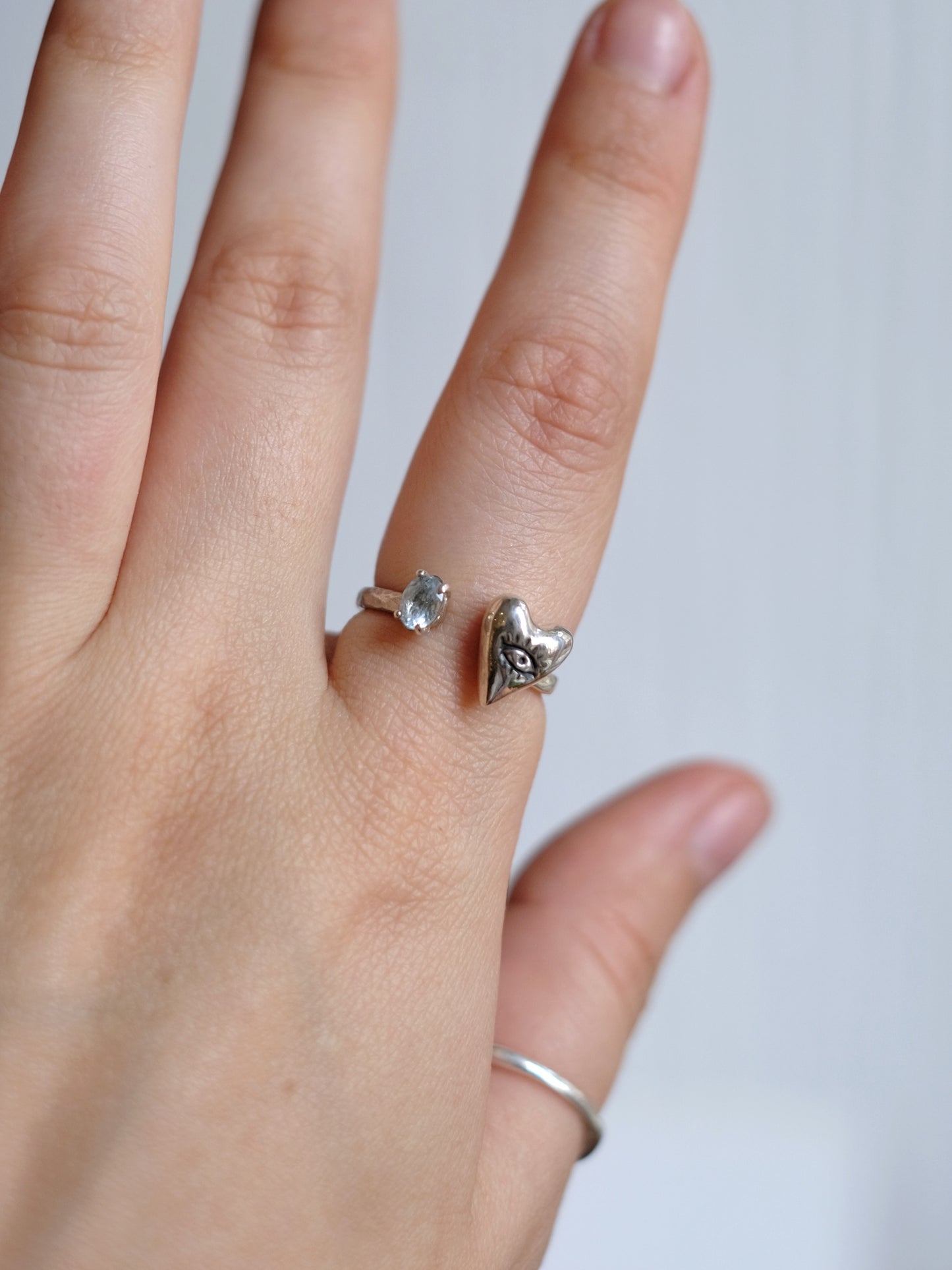 Ring Looking Heart with "Topaz"