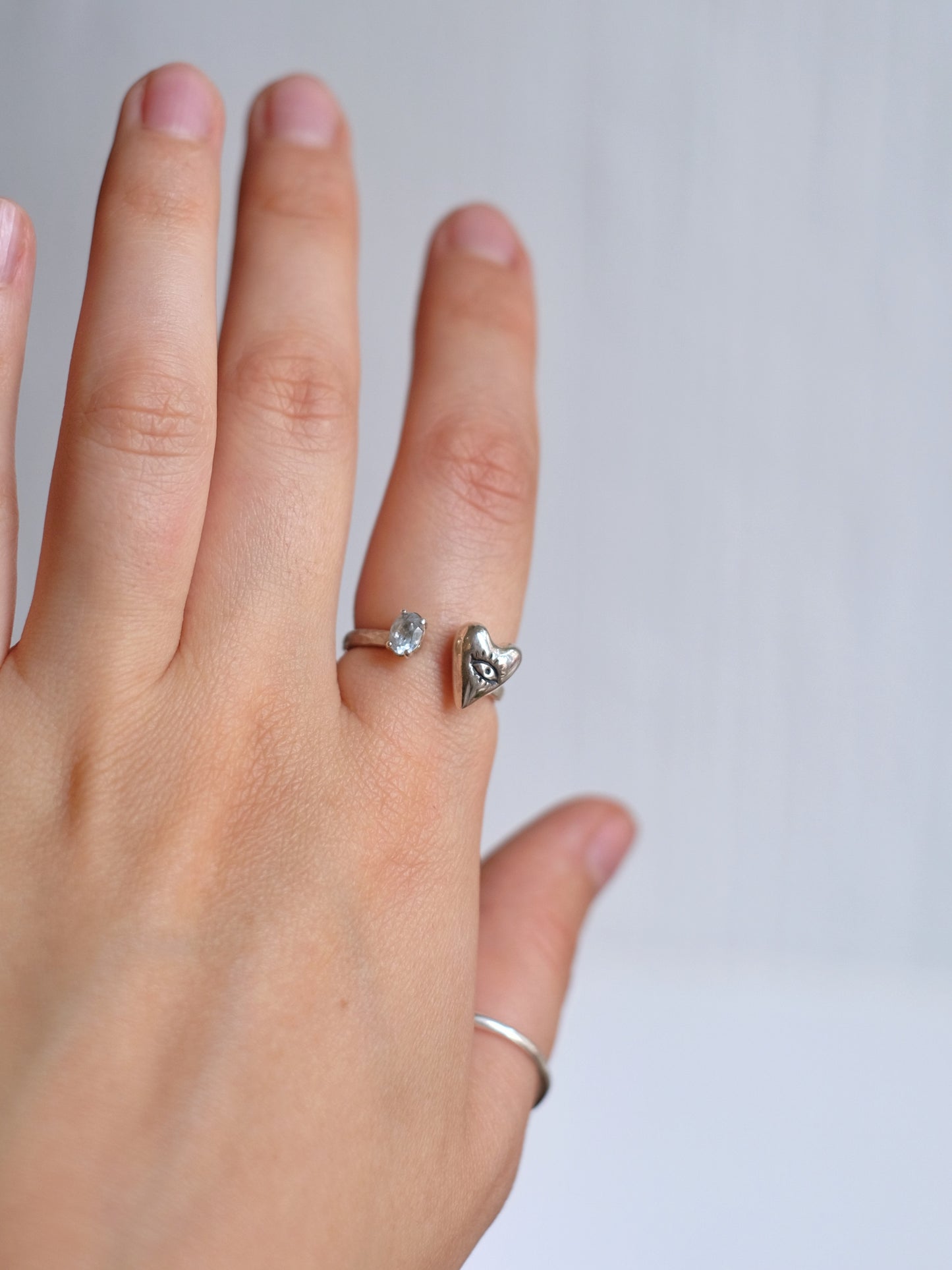 Ring Looking Heart with "Topaz"