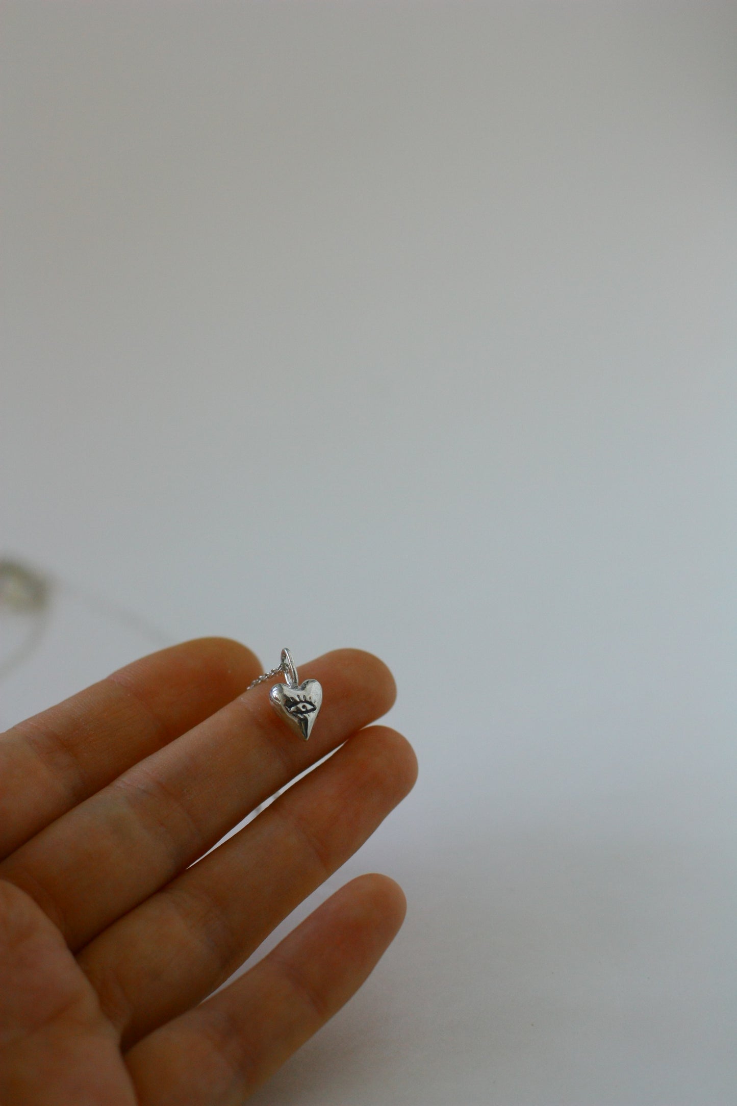 Sterling silver heart pendant with looking eye - Looking Heart design