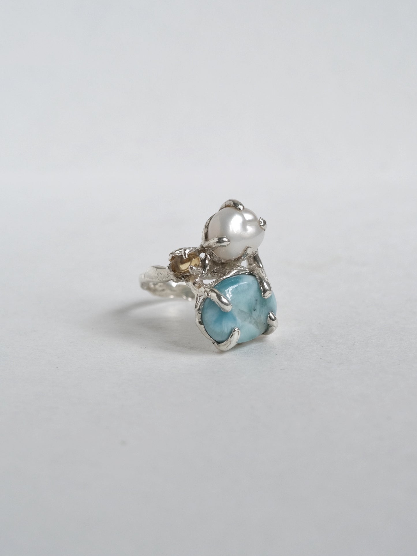 Ring with "Pearl, citrine and blue stone"