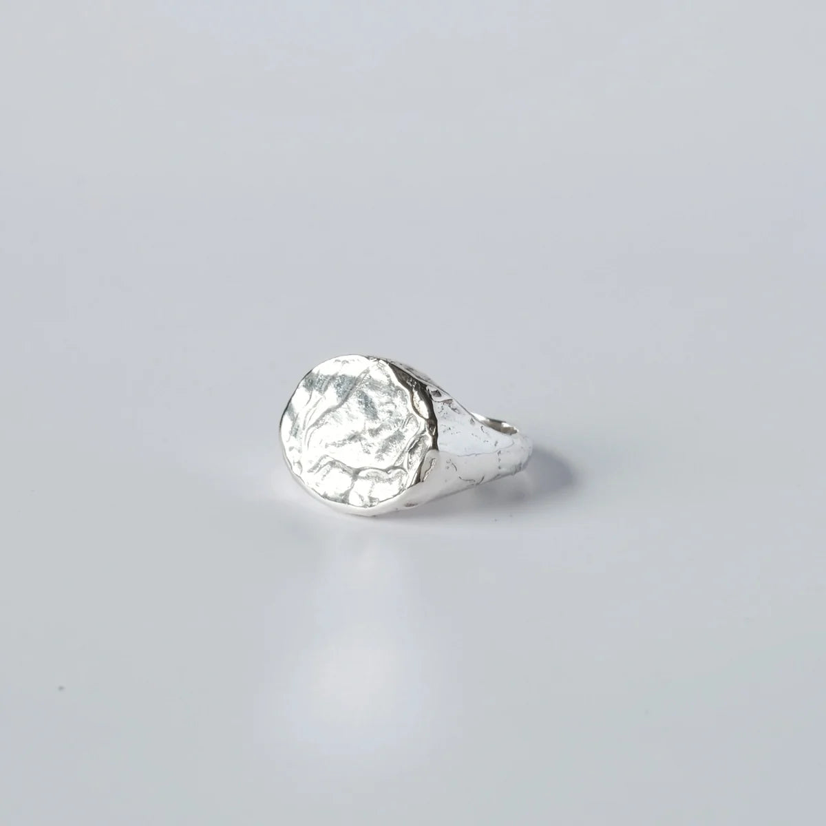 Bryzhi handmade sterling silver textured signet ring, front view