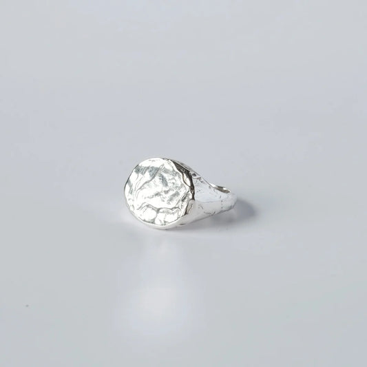 Bryzhi handmade sterling silver textured signet ring, front view