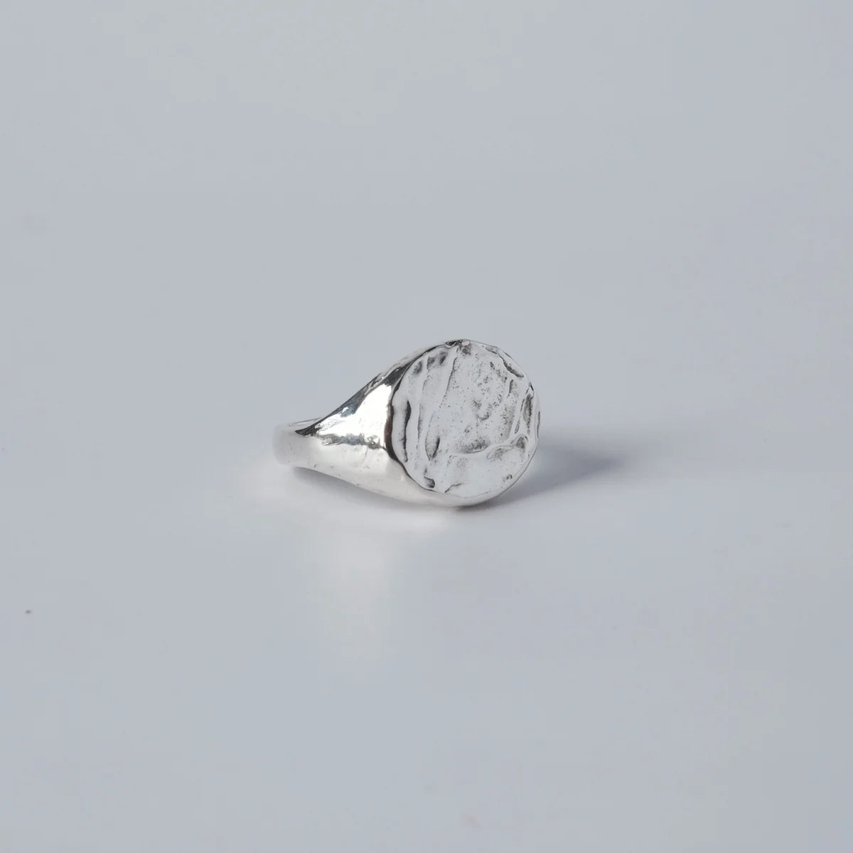 Bryzhi handmade sterling silver textured signet ring, side view