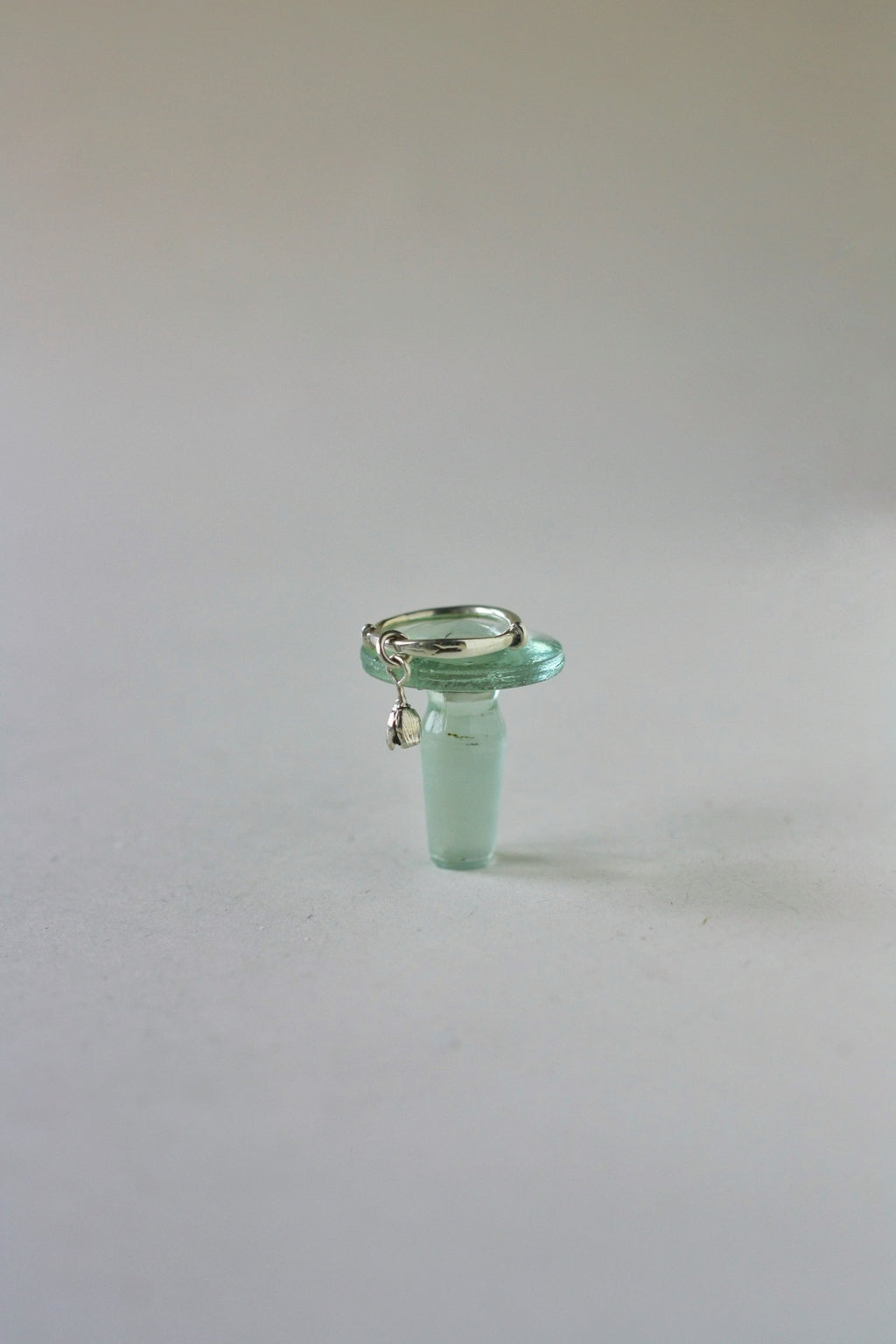 Ring with tulip pendant